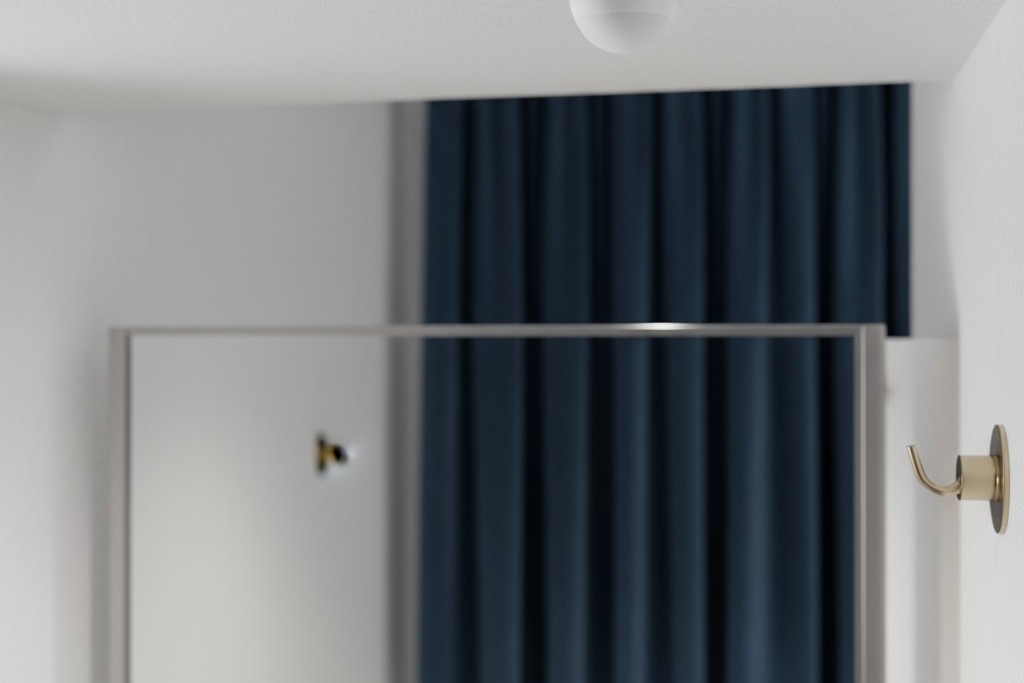 Um pequeno sensor de movimento discreto instalado no canto do teto de um provador elegante.