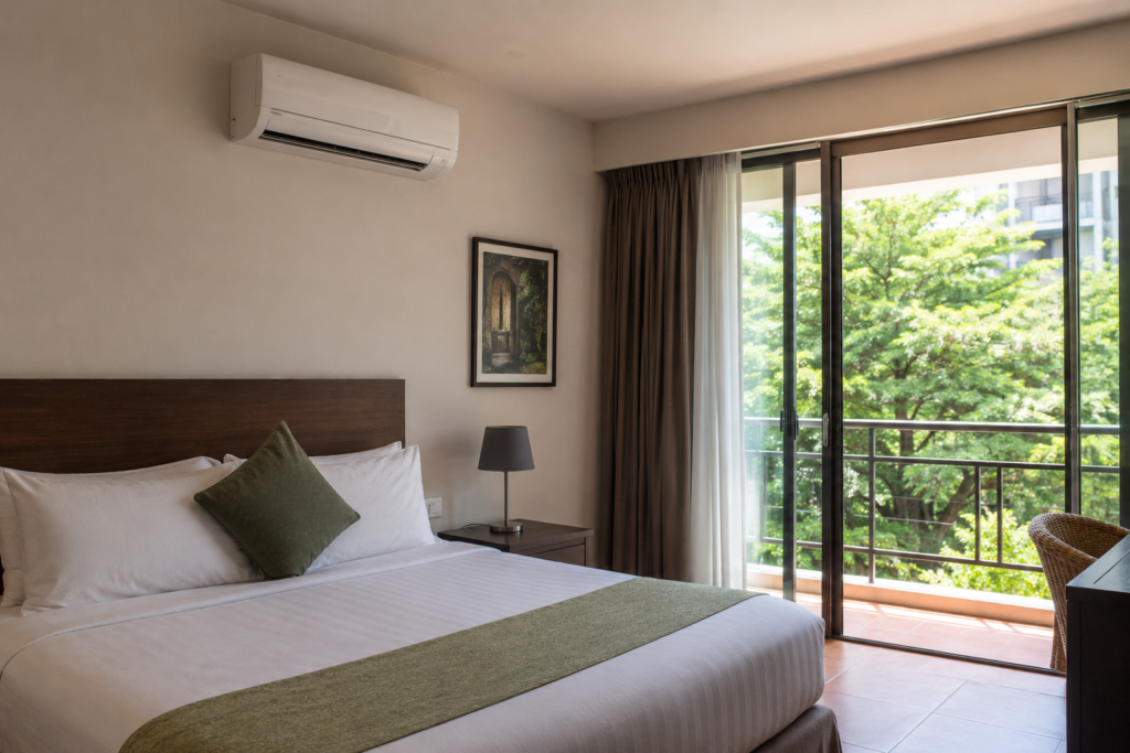 Boutique hotel room with a split air conditioner